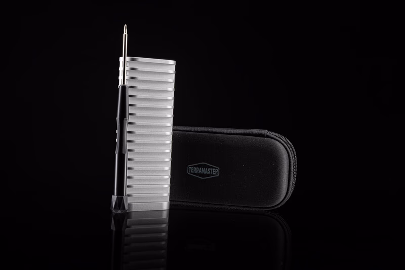 Dog grooming slicker brush and carrying case against black background